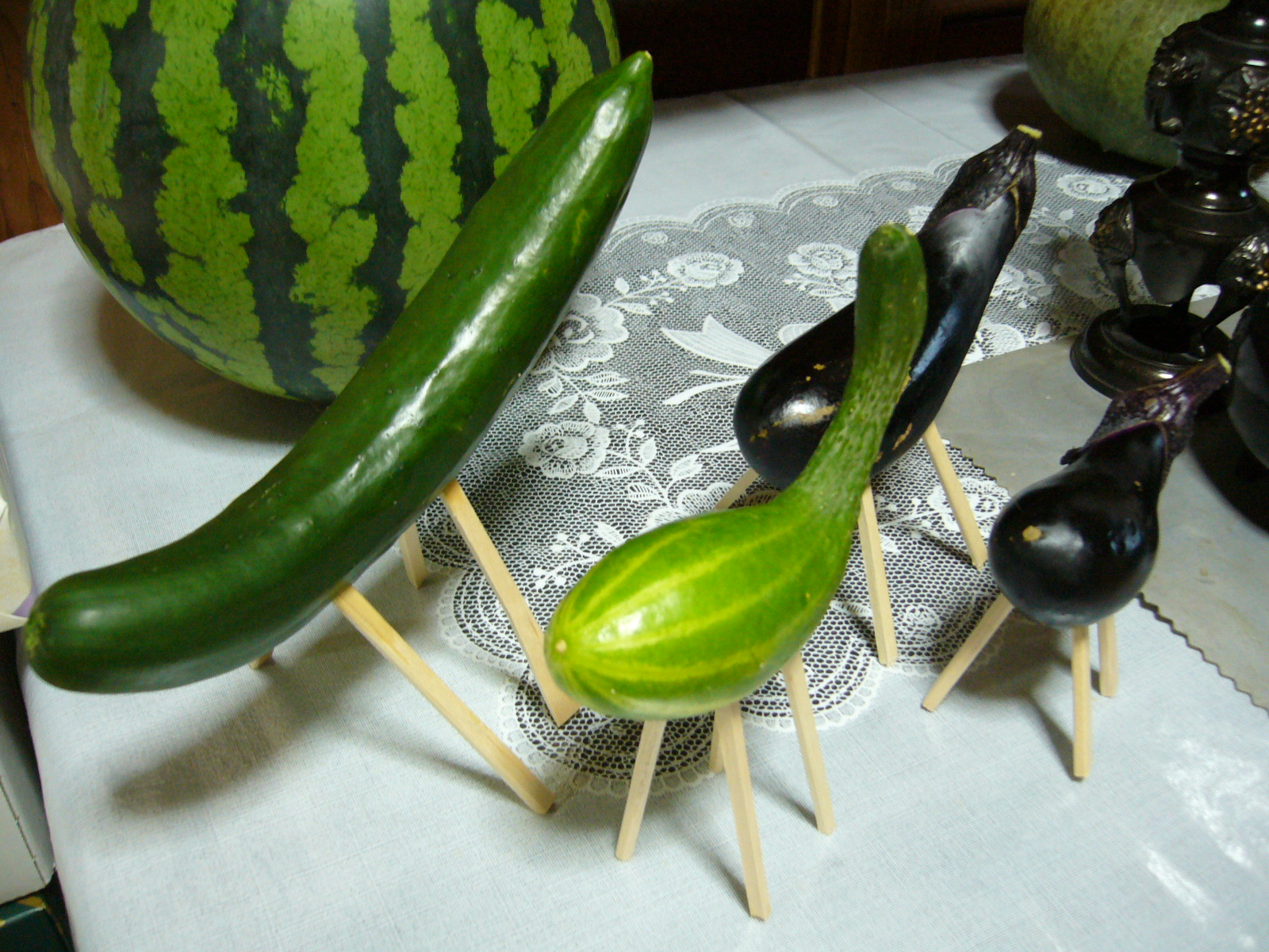 cucumbers and eggplants with chopsticks in them so their ancestors can get home from the spirit world.